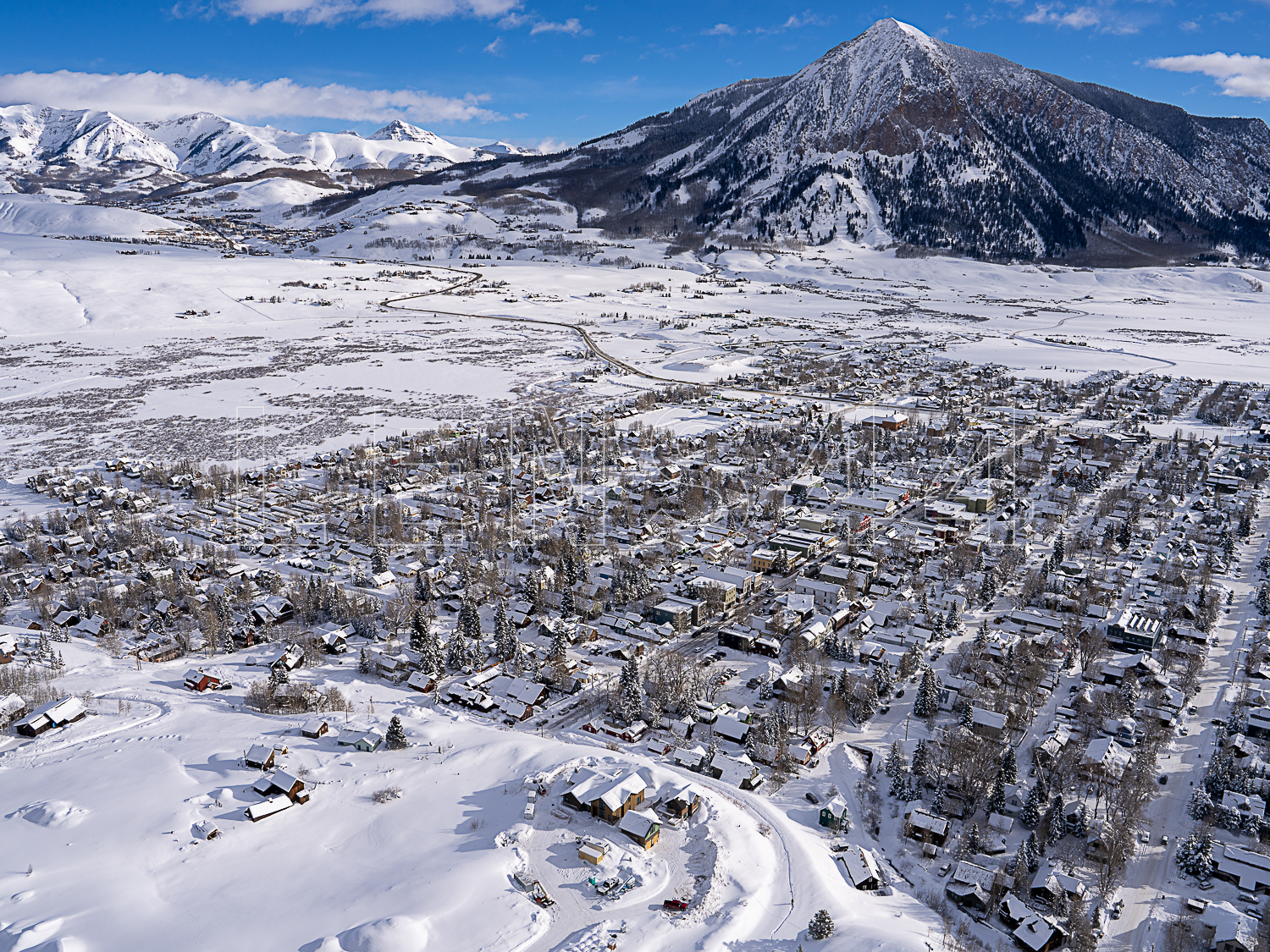 Crested Butte with snowy Mt Butte in the distance